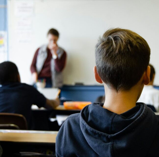 High school students working in a classroom
