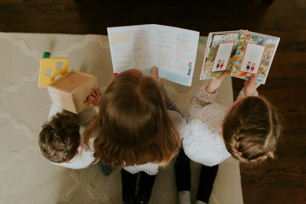 Children looking at a picture book together
