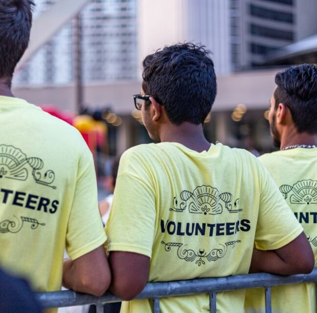 Volunteers in matching shirts at a community event